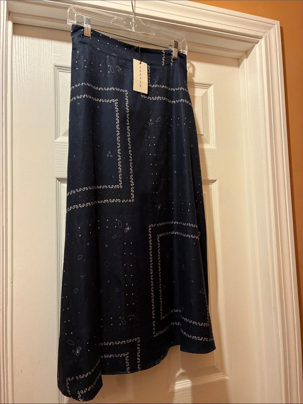 Harper Navy Blue Midi Skirt with bandana or paisley print pattern. It has lining
